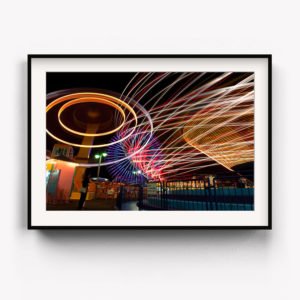 Framed Art Print of the rides at Cosmoworld in full swing