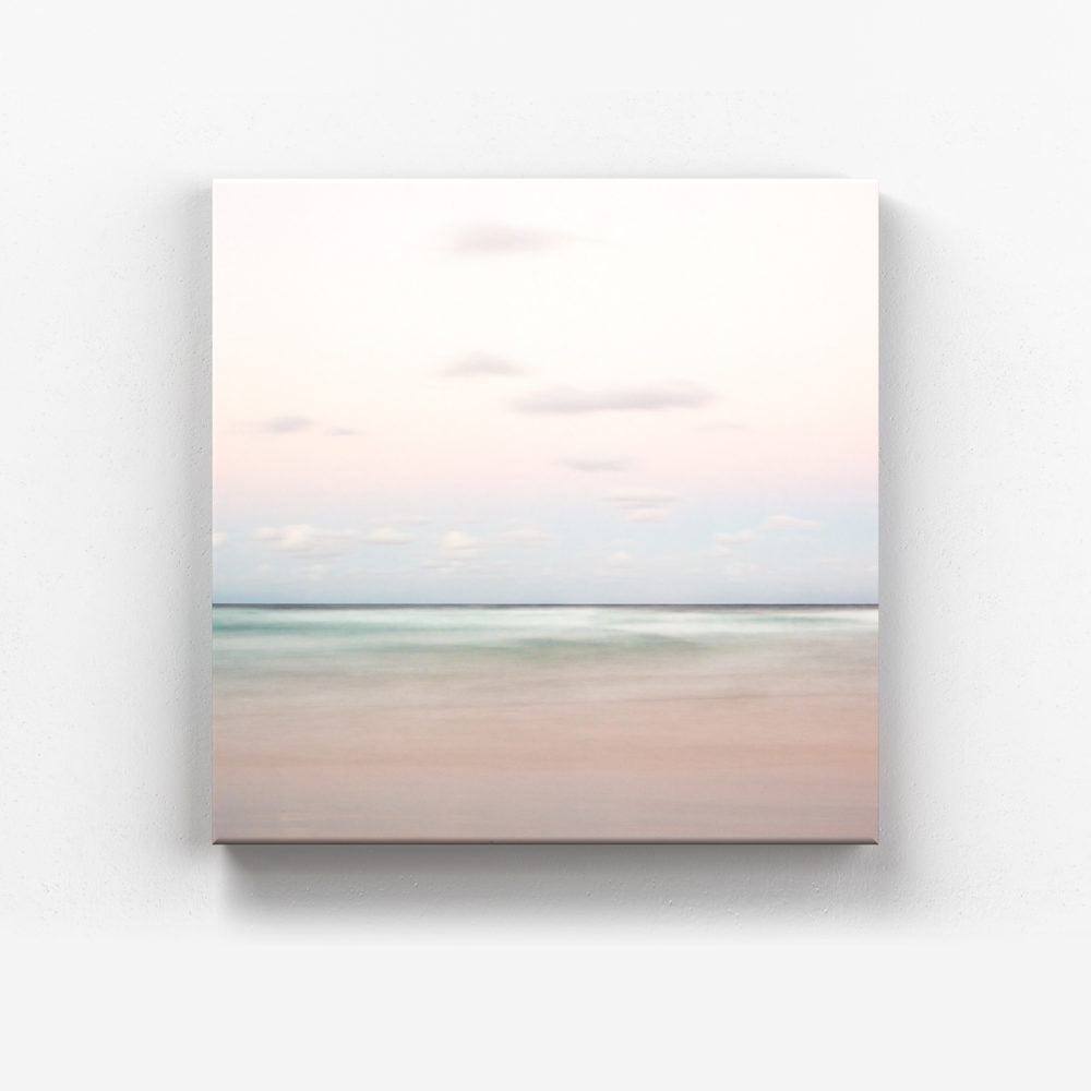 Canvas print of A pastel sunset at Belongil Beach, Byron Bay